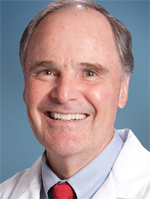 A person smiling for the camera Description automatically generated with low confidence