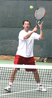 A person playing tennis Description automatically generated with medium confidence