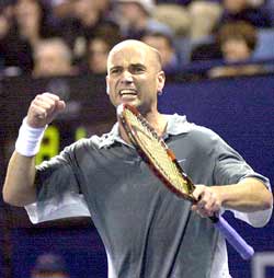 A person holding a tennis racket Description automatically
generated