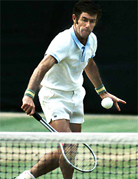 A person hitting a ball with a tennis racket Description automatically generated