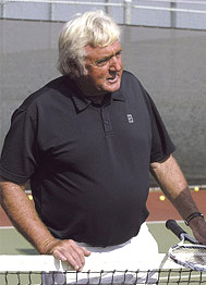A person playing ping pong Description automatically generated with medium confidence