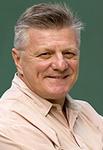 A person smiling for the camera Description automatically generated with low confidence