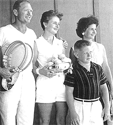 A group of people holding tennis rackets Description automatically generated with medium confidence