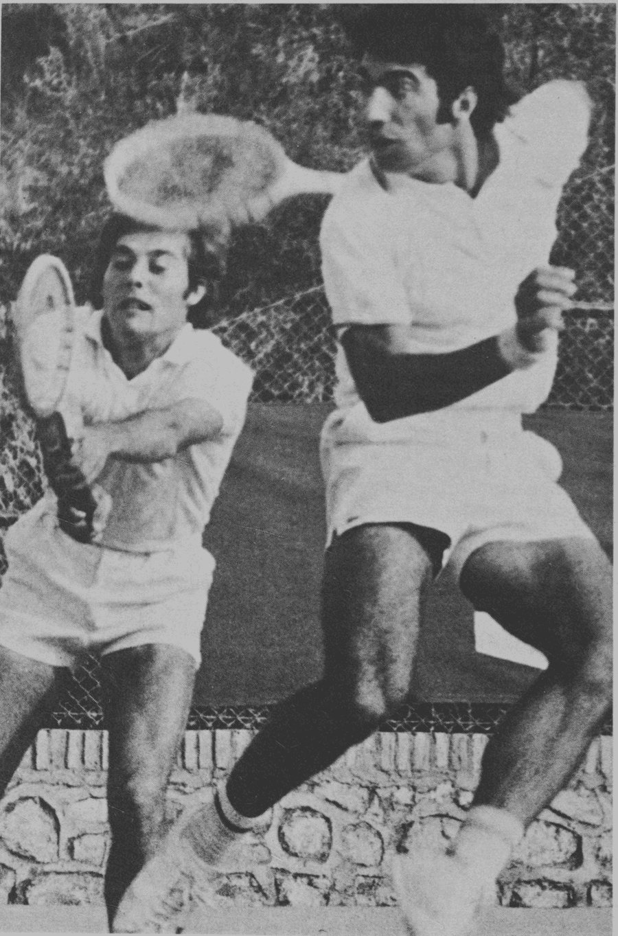 Concentration and effort, two winning characteristics, show clearly in this photo of Manolo Orantes and Ramon Munoz play
